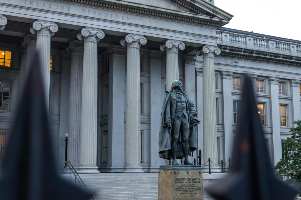 the statue of albert gallatin in front of the treasury building